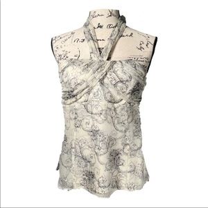 Ties at the neck silk lined size 6, 100% SILK top with side zipper.